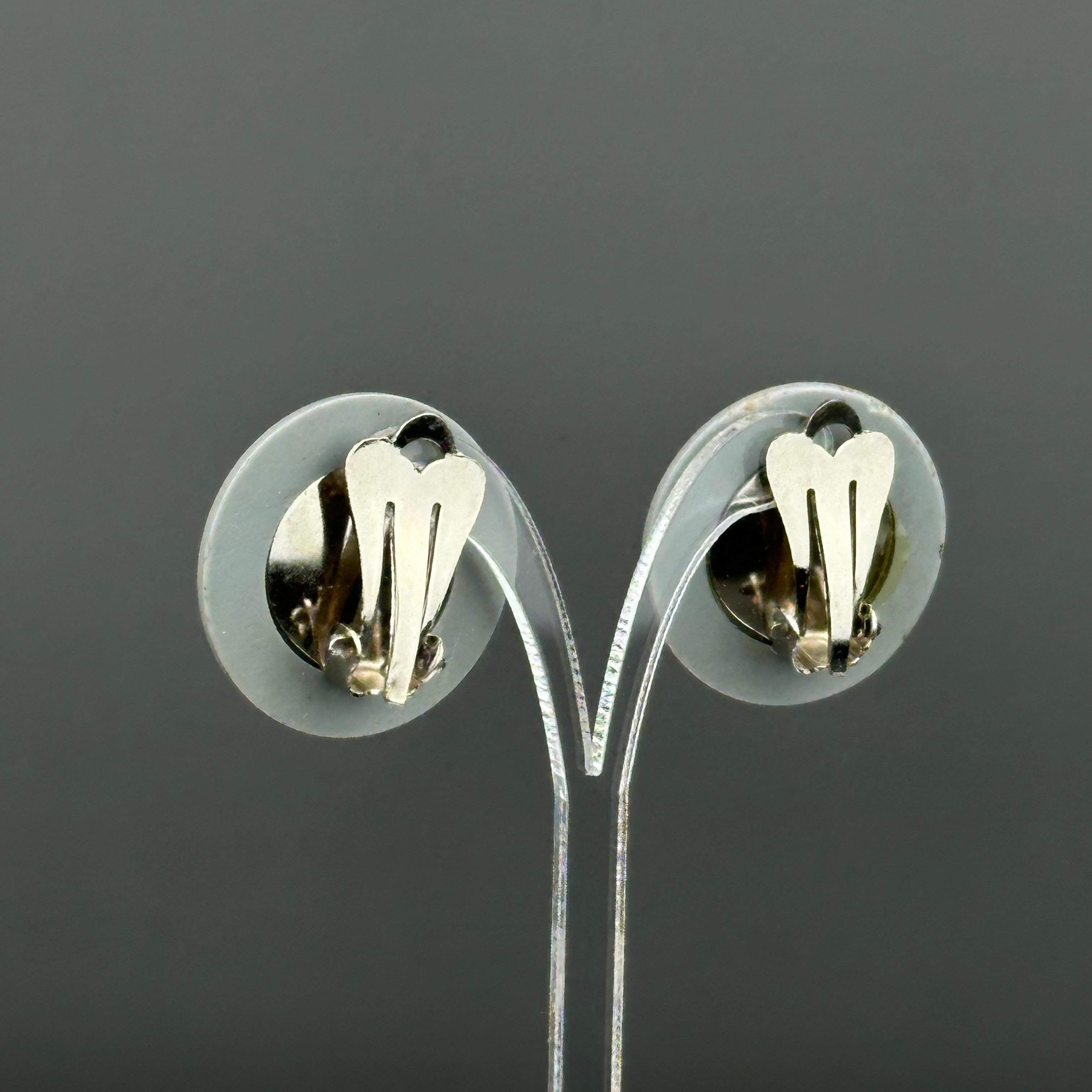 Vintage grey & black plastic round clip on earrings with clear crystal