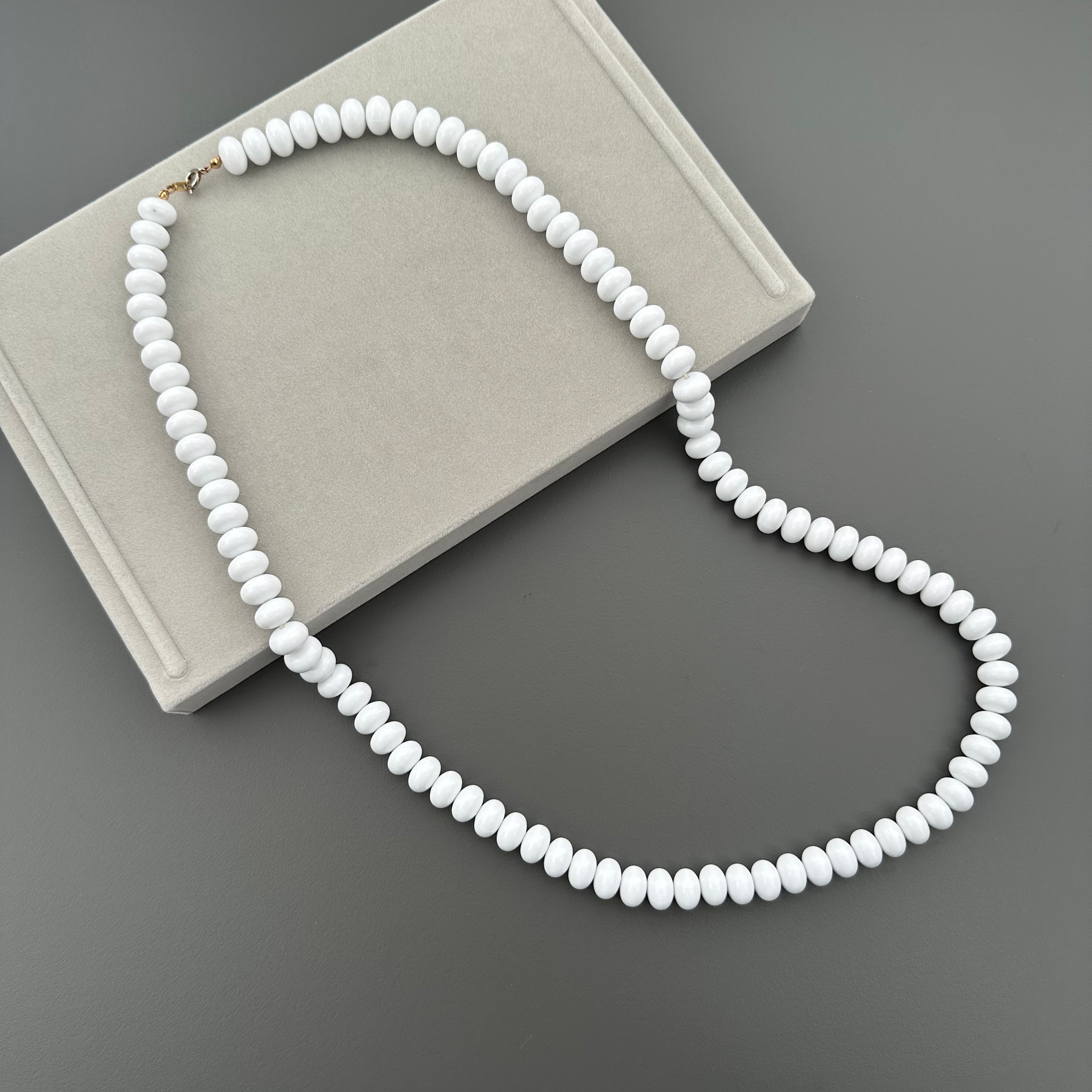 Vintage long white plastic bead necklace
