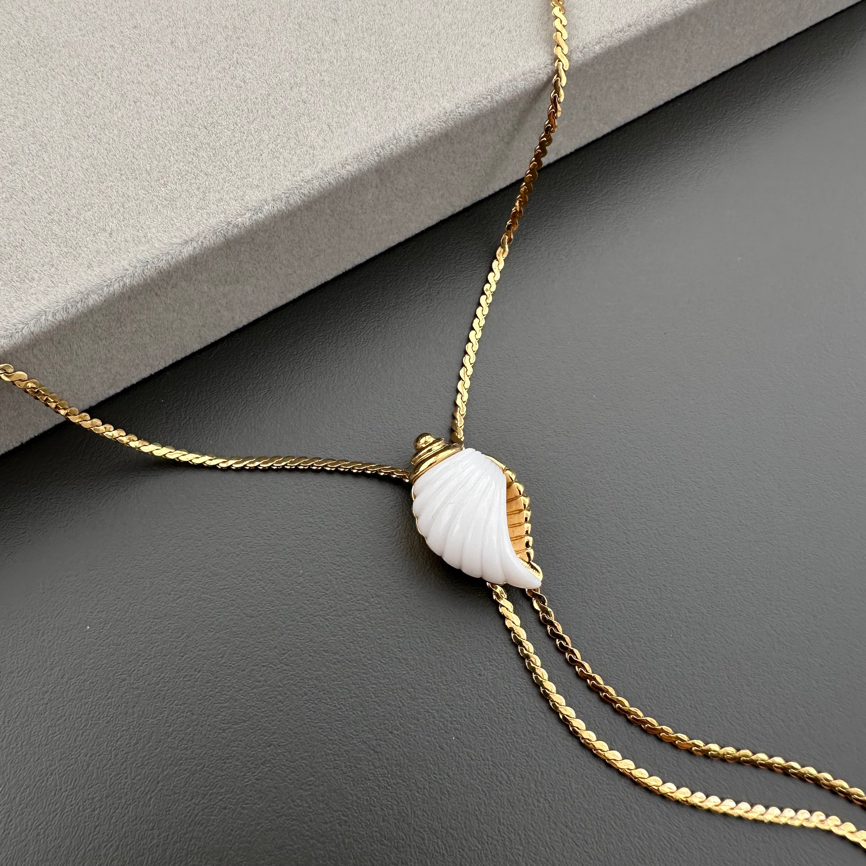 intage AVON gold tone sliding lariat necklace with white shell pendant