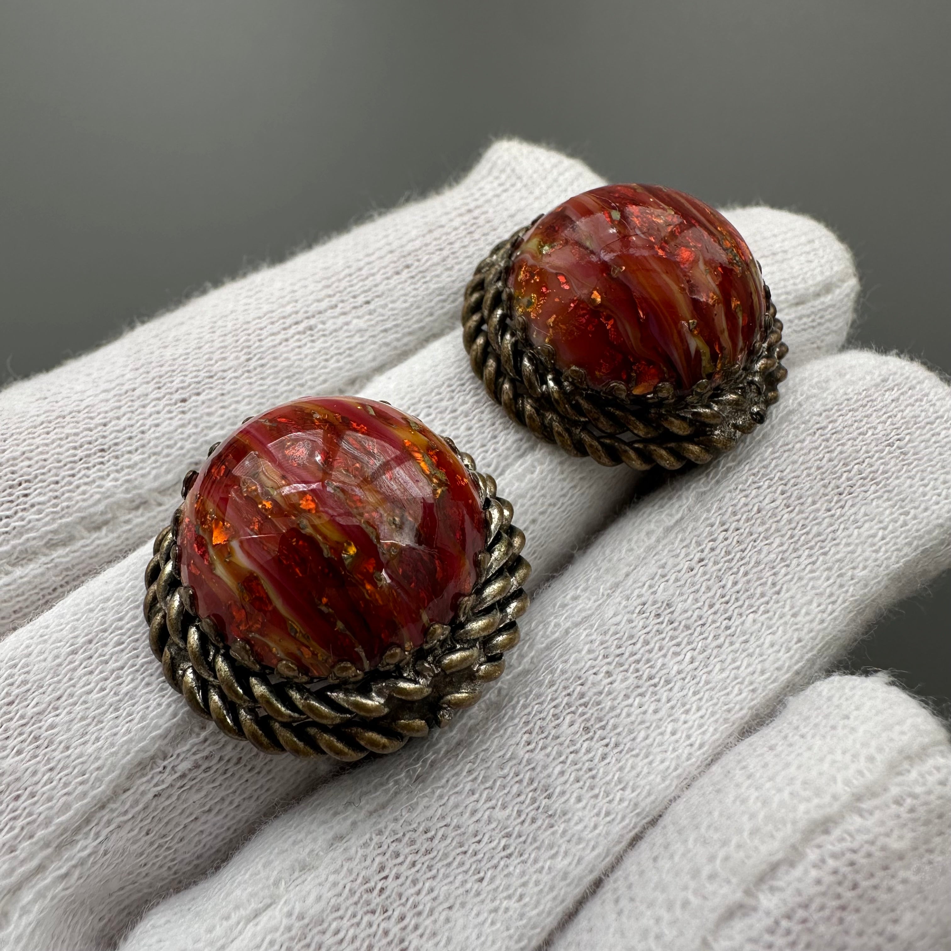 Vintage bronze tone and red art glass round clip-on earrings