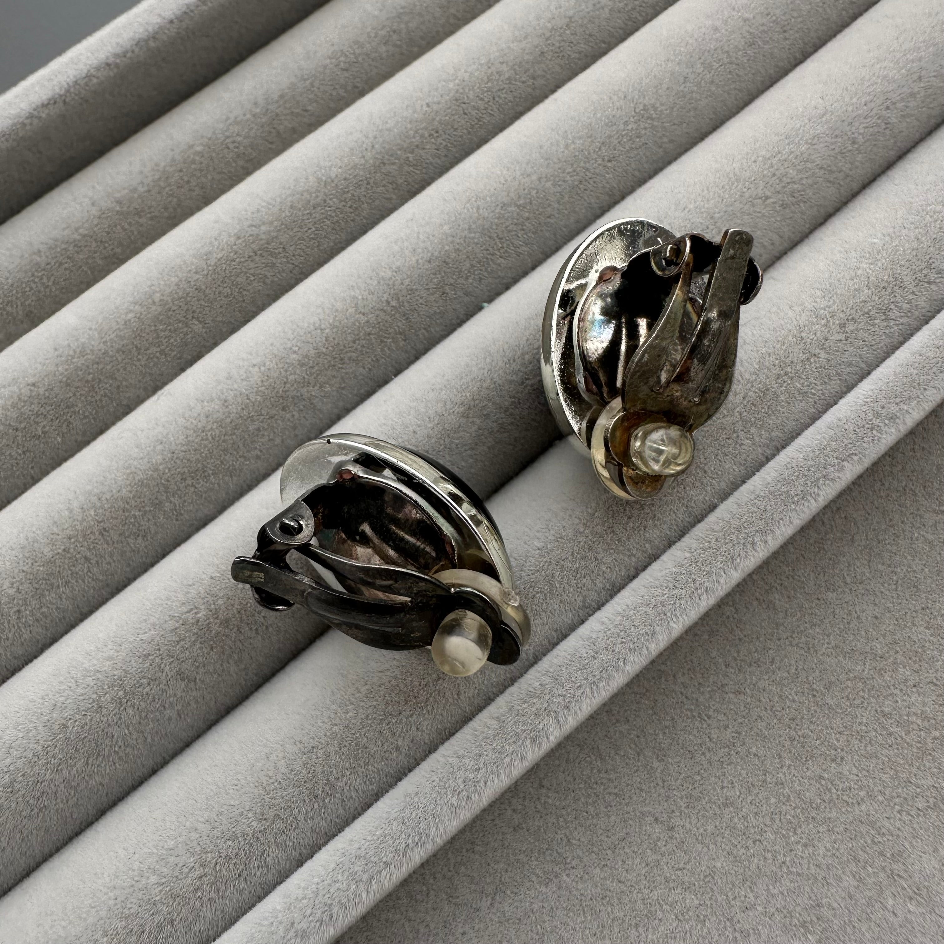 Vintage silver tone and black oval clip on earrings