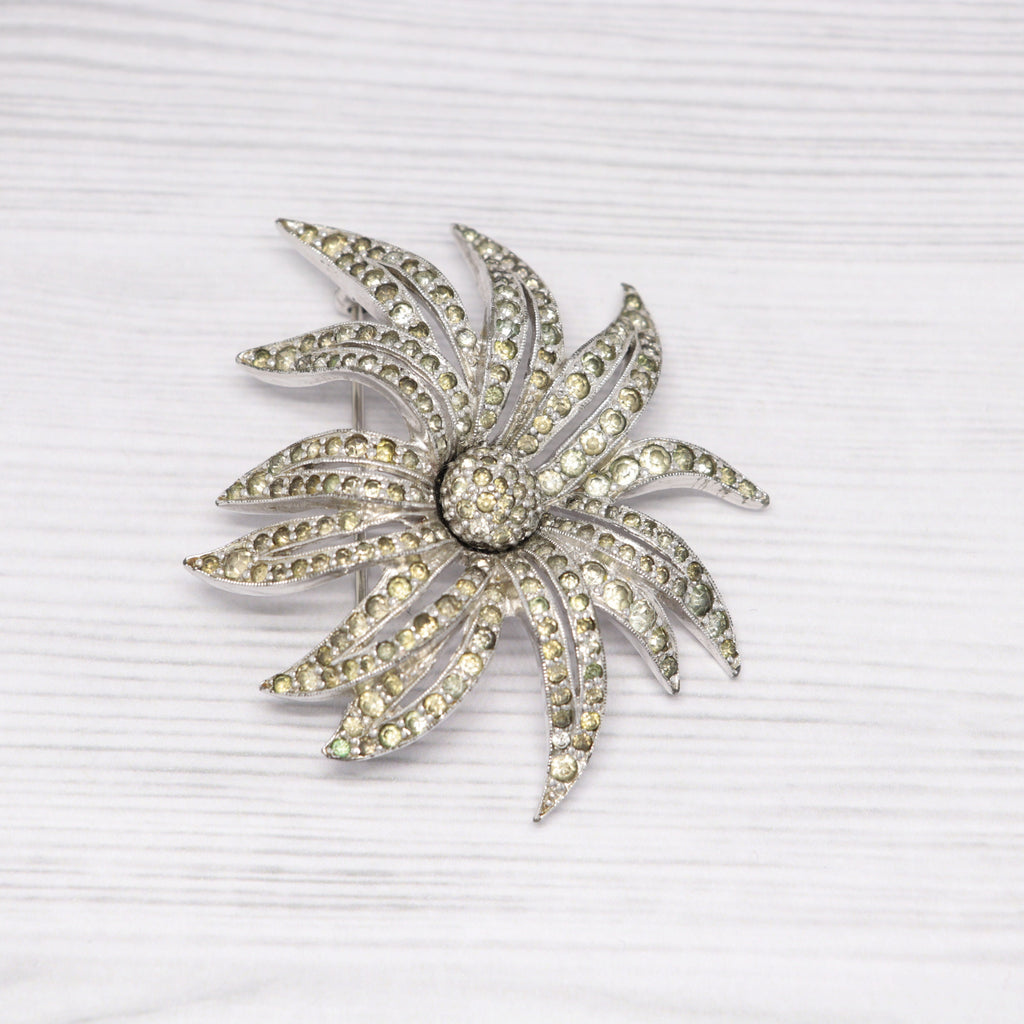 Vintage Jomaz silver-tone and rhinestone flower brooch