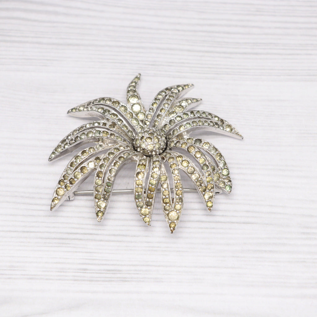 Vintage Jomaz silver-tone and rhinestone flower brooch