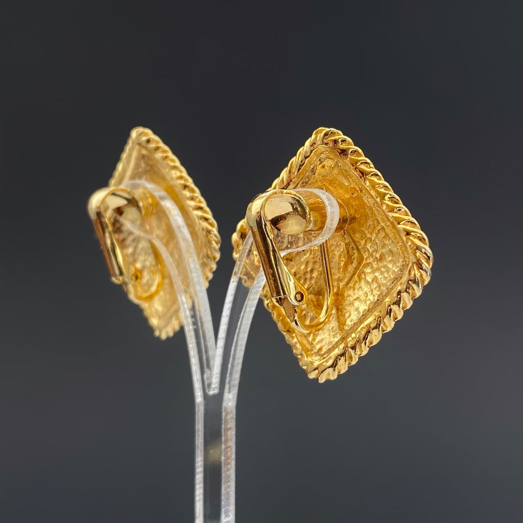 Vintage gold tone and red enamel clip on earrings