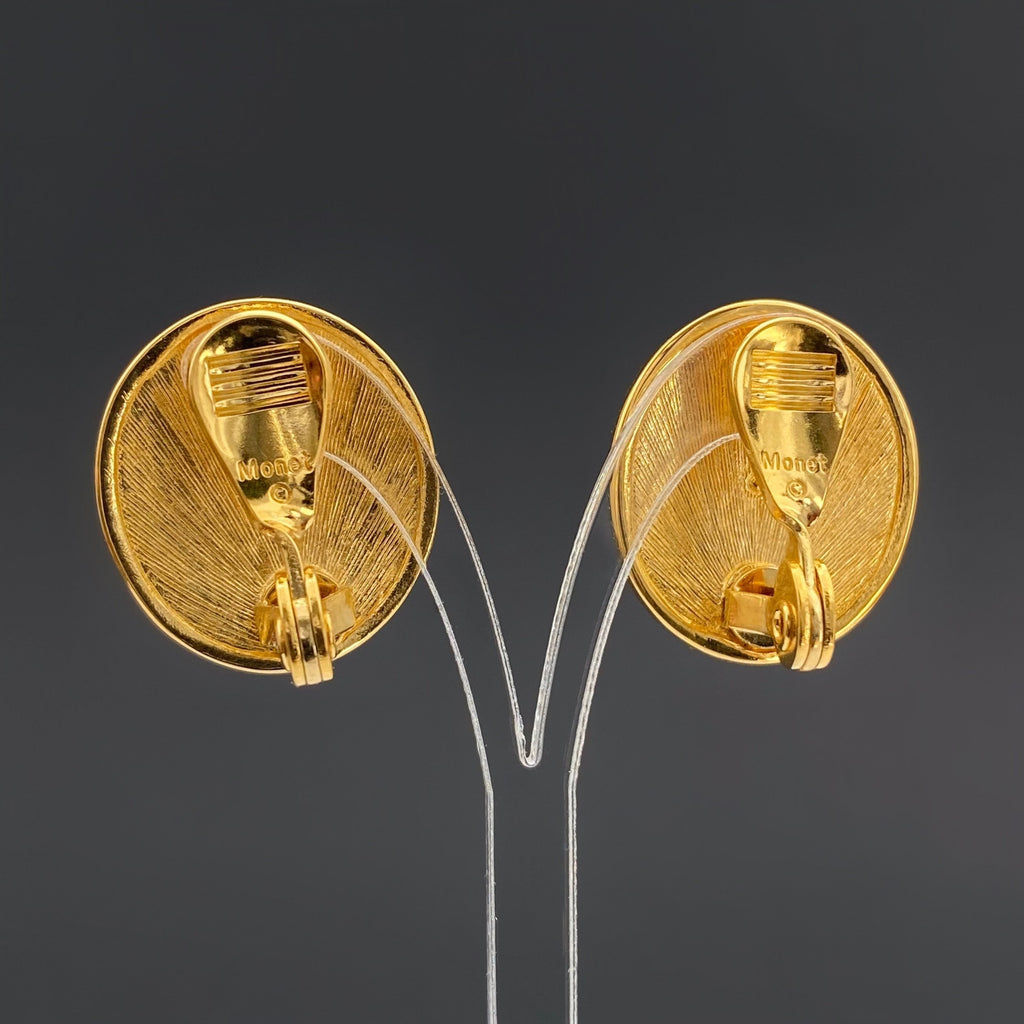 Vintage MONET Clip On Earrings: Gold Tone Beige Swirl Enamel