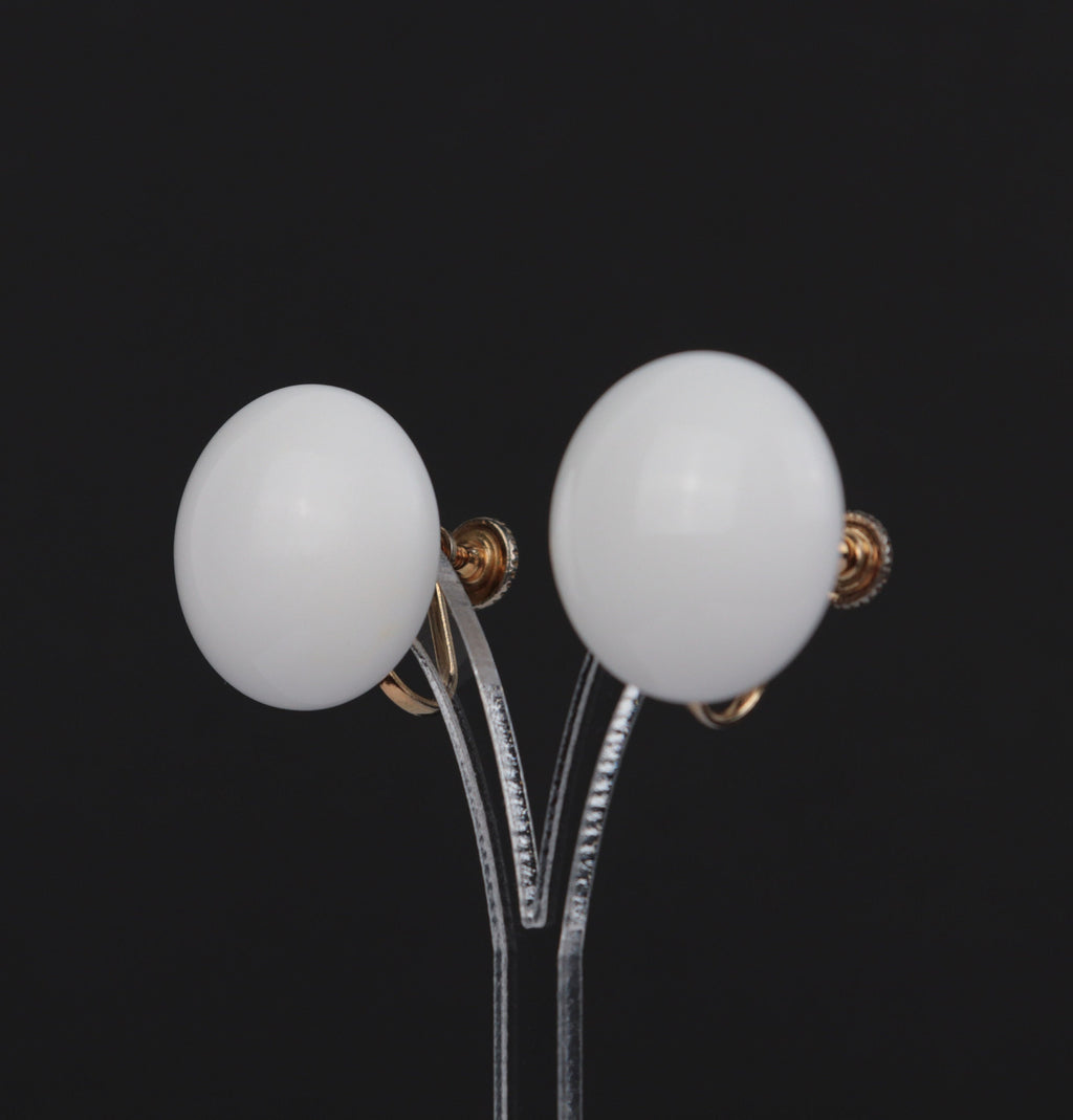 Vintage white plastic circle screw back earrings