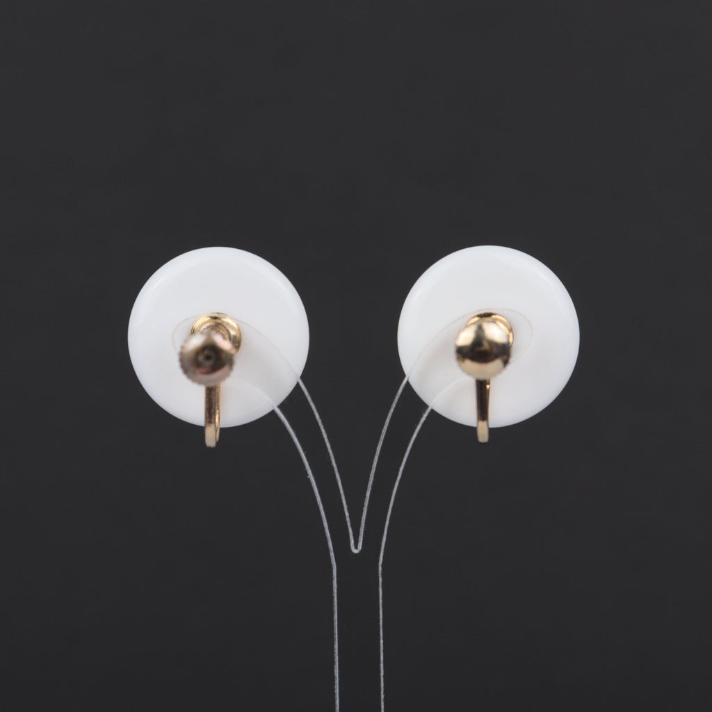 Vintage white plastic circle screw back earrings