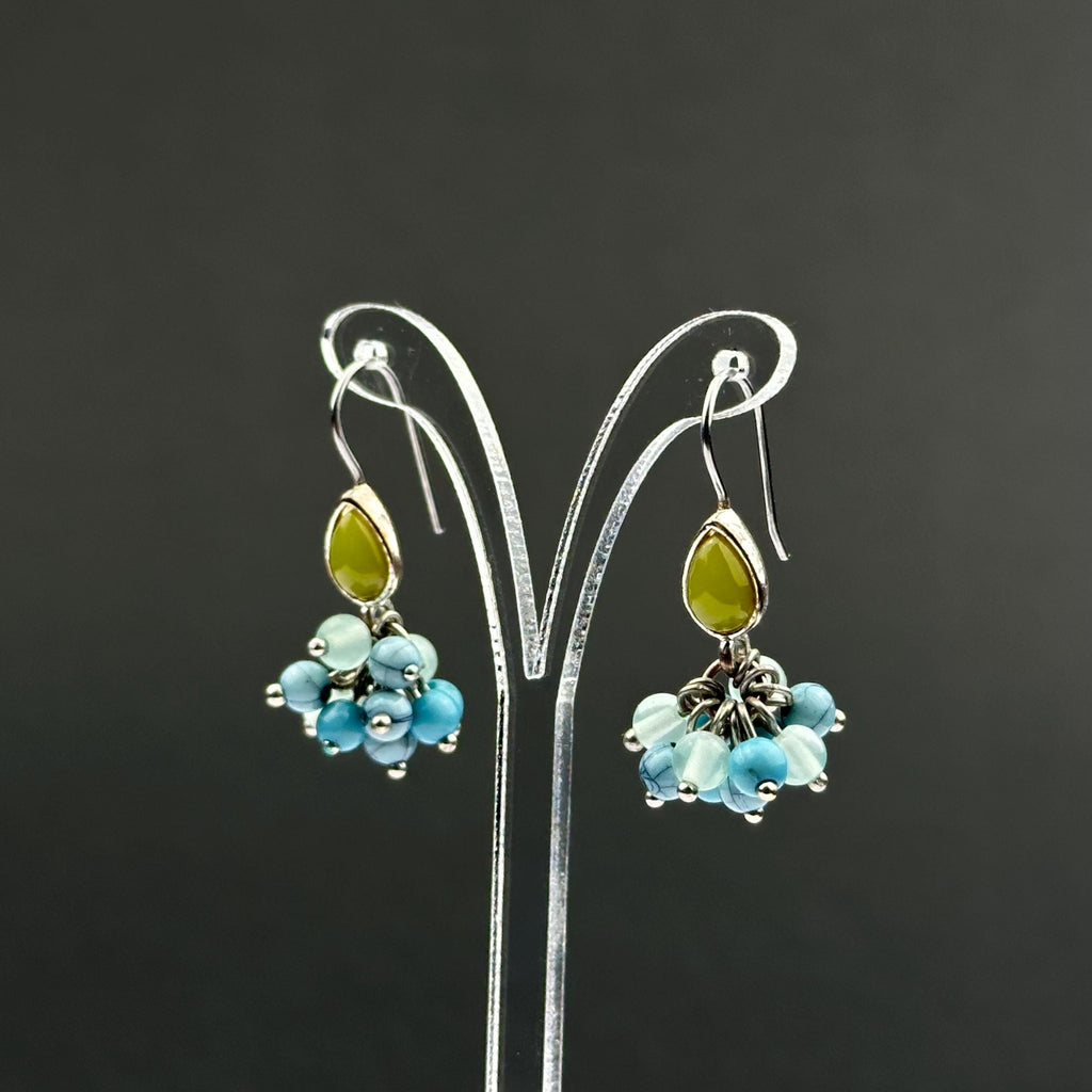 Vintage Monet drop earrings with green and blue bead