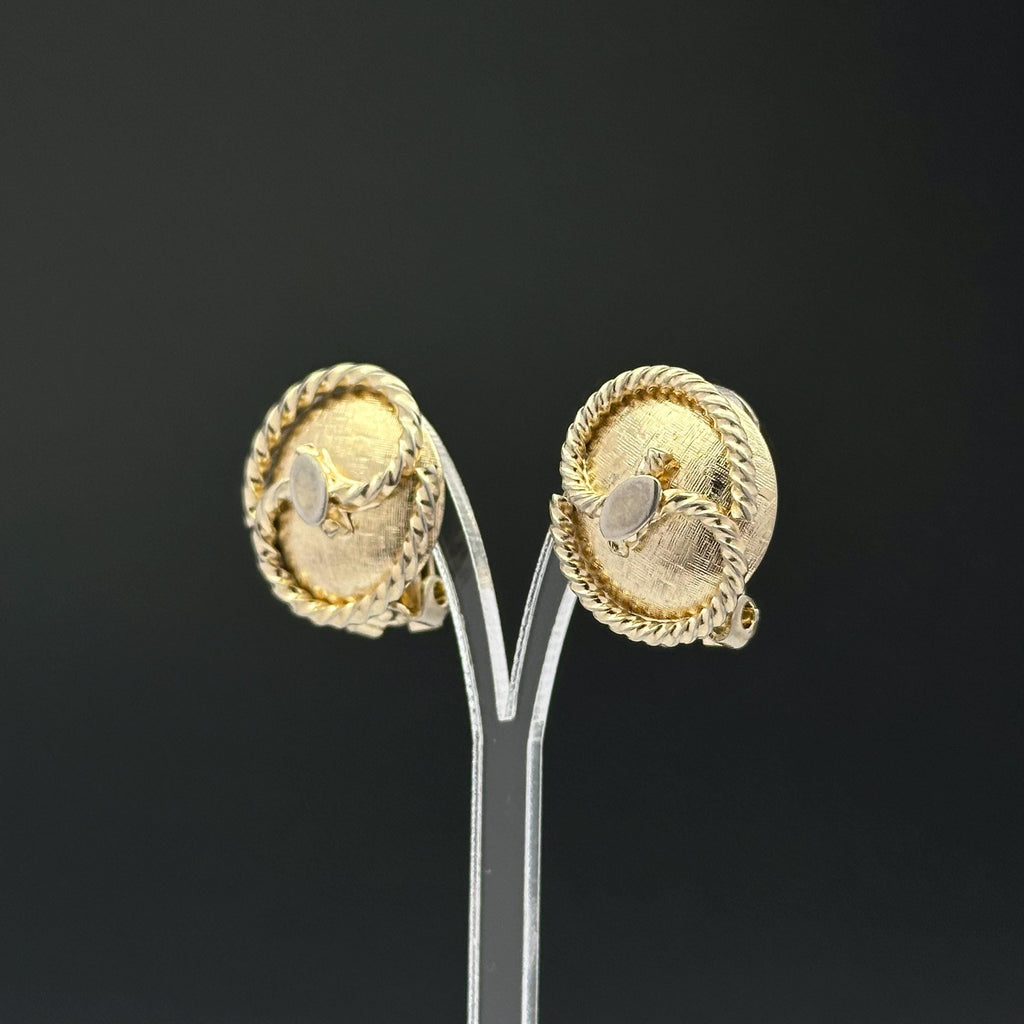 Vintage gold tone oval clip on earrings