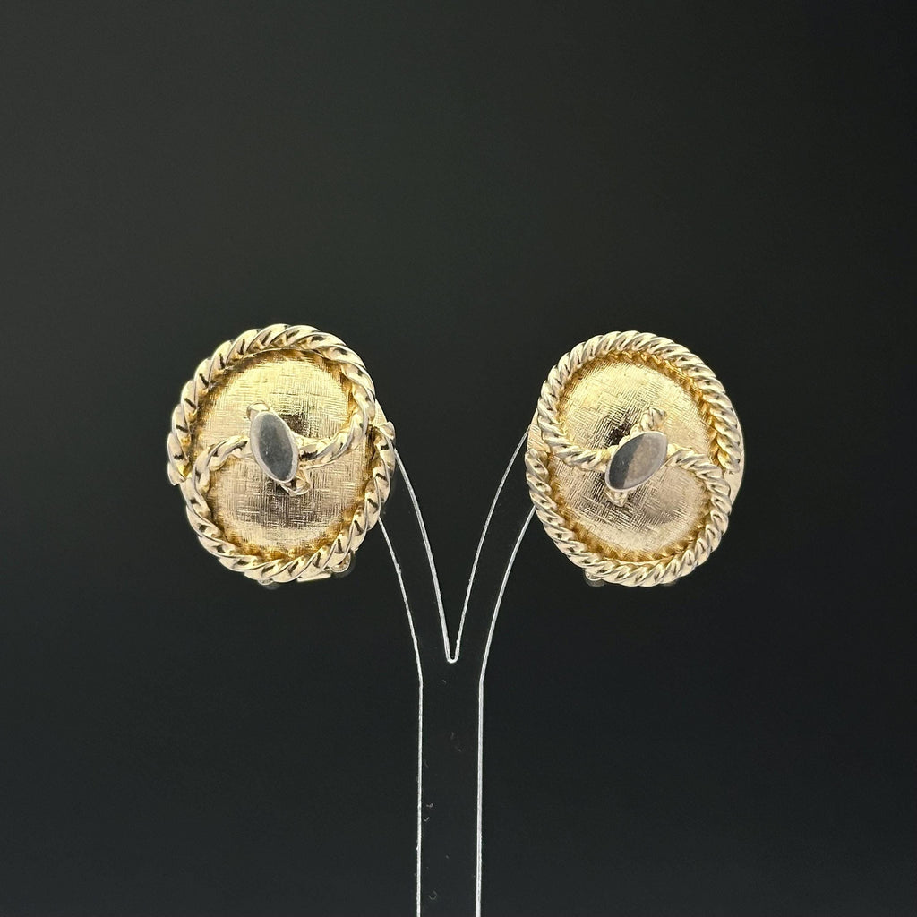 Vintage gold tone oval clip on earrings