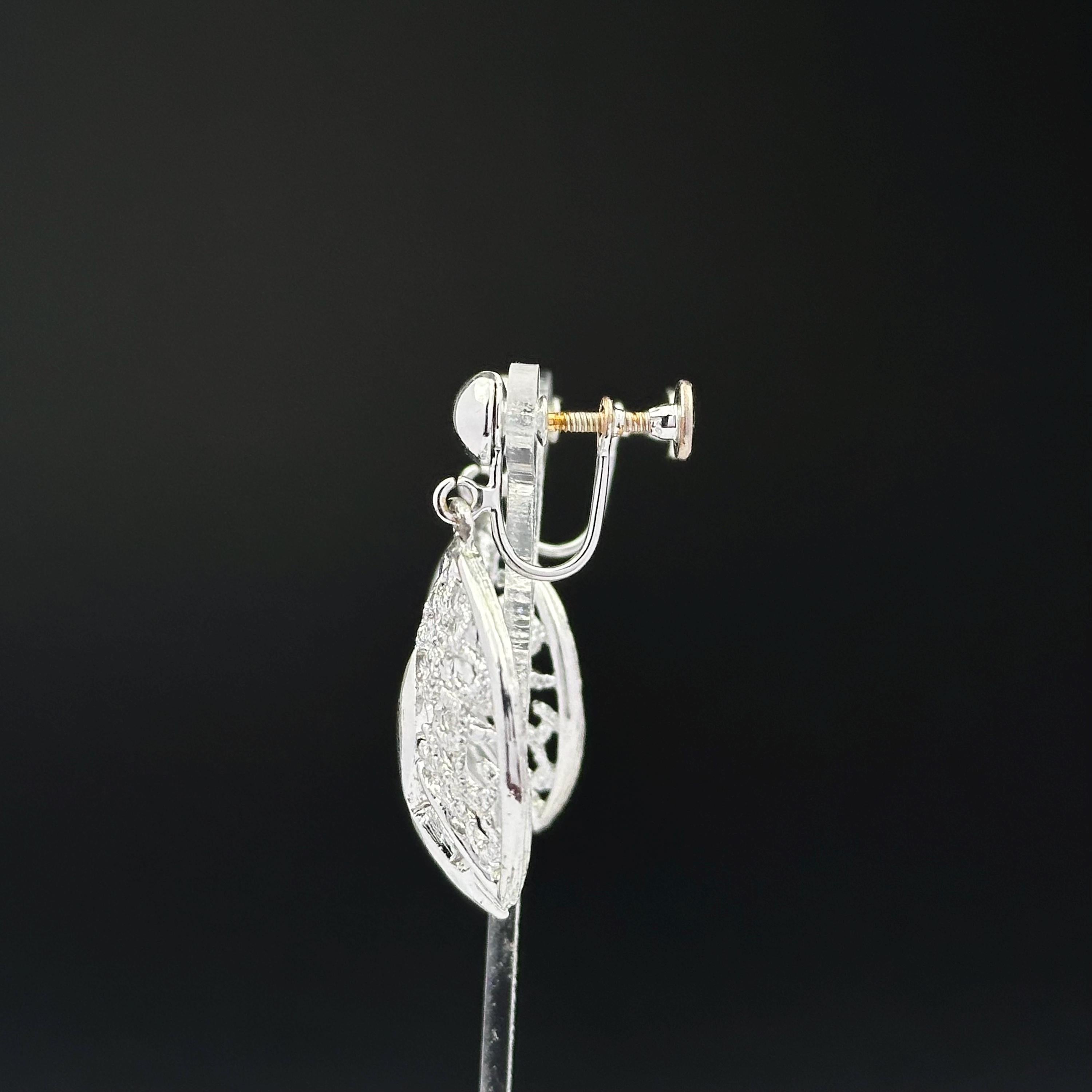 Vintage silver tone filigree dangle screw back earrings