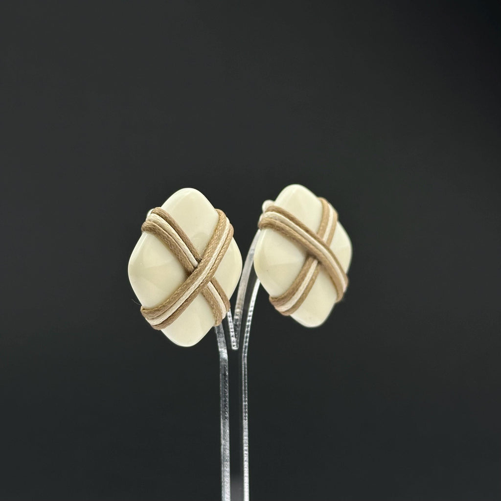 Vintage white plastic geometric clip on earrings