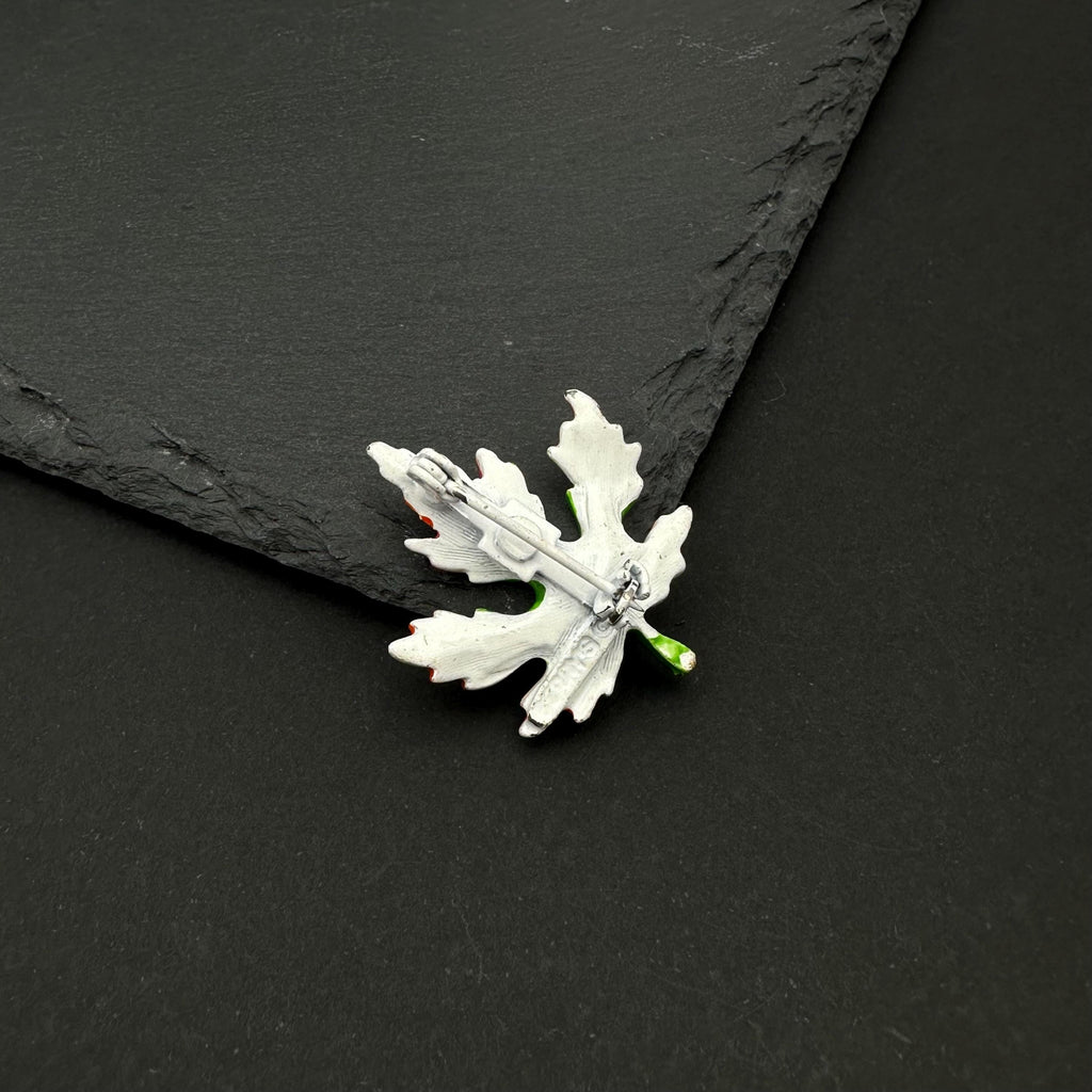 Vintage Gerry's enamel leaf brooch