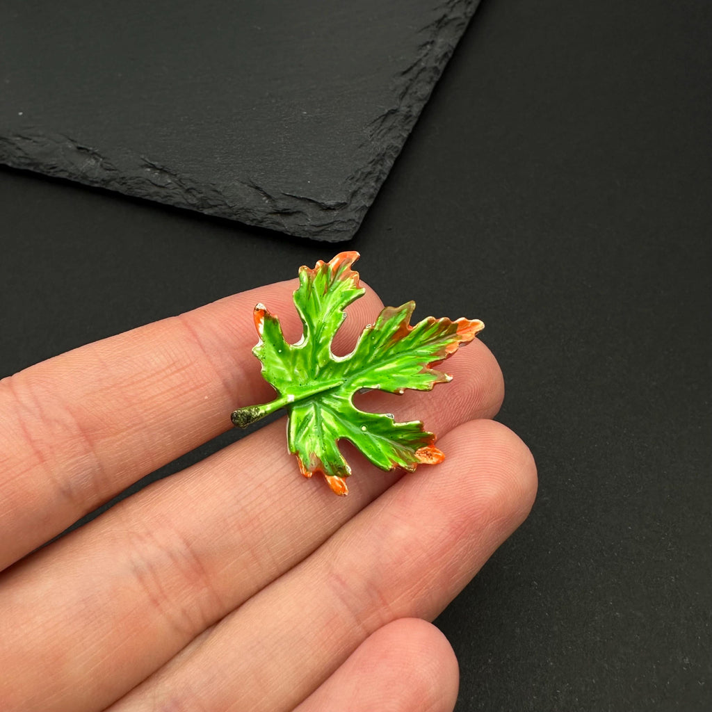 Vintage Gerry's enamel leaf brooch