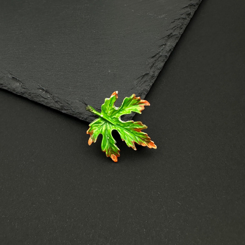 Vintage Gerry's enamel leaf brooch