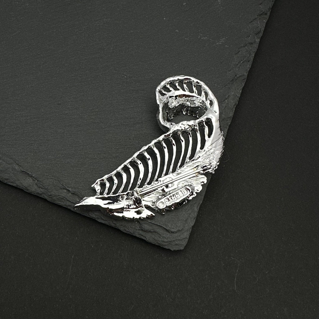 Vintage Gerry's silver tone feather brooch