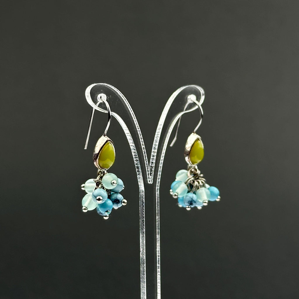 Vintage Monet drop earrings with green and blue bead
