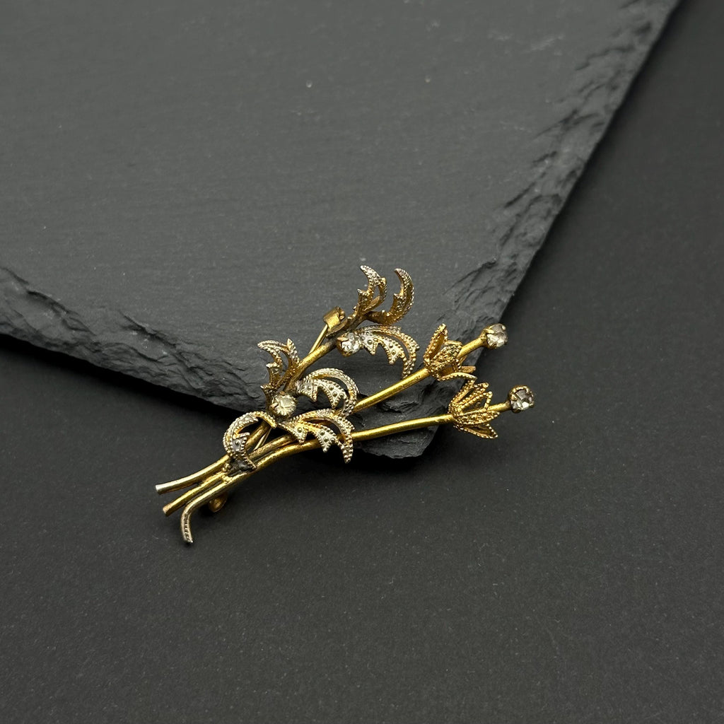 Vintage gold tone and crystal bouquet brooch