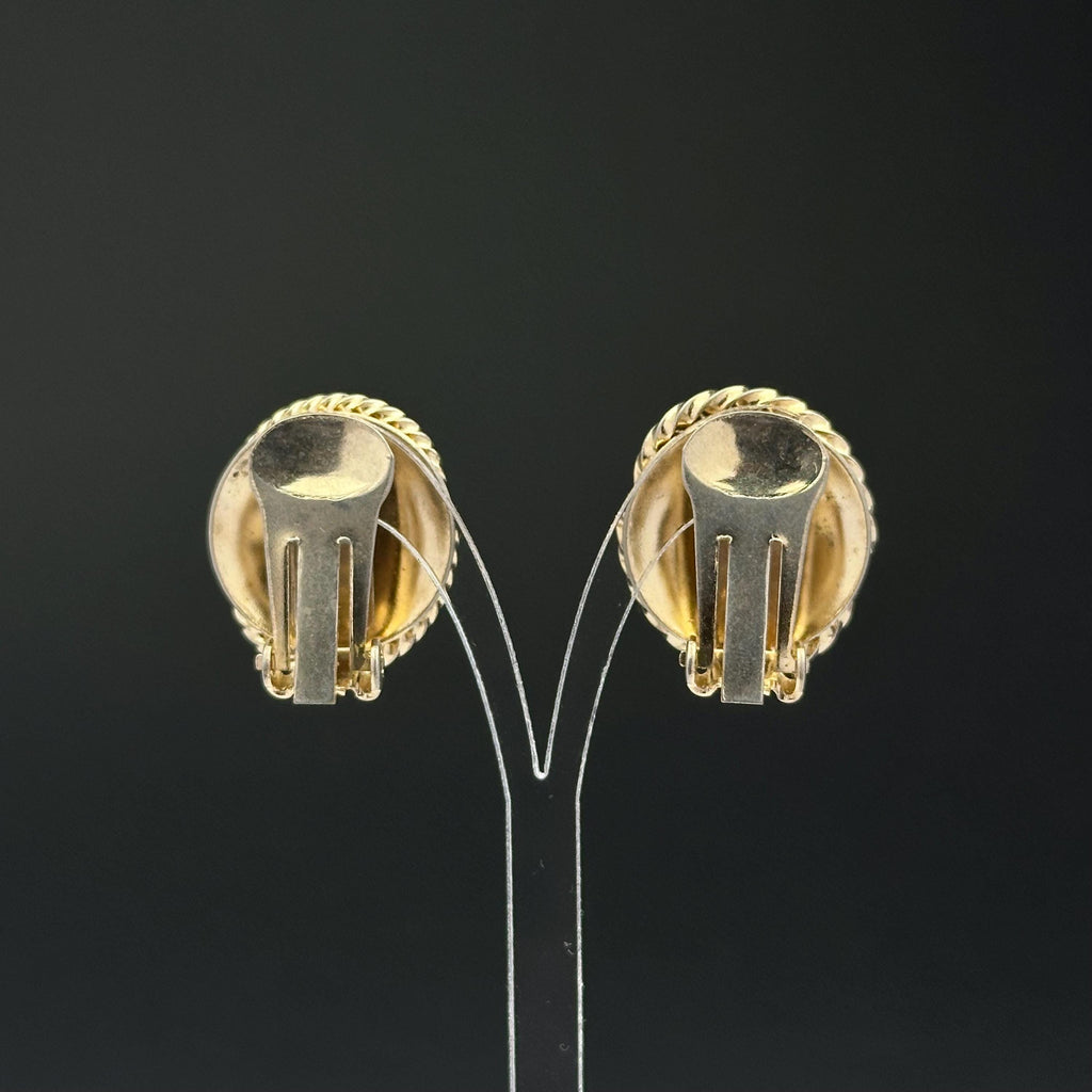 Vintage gold tone oval clip on earrings