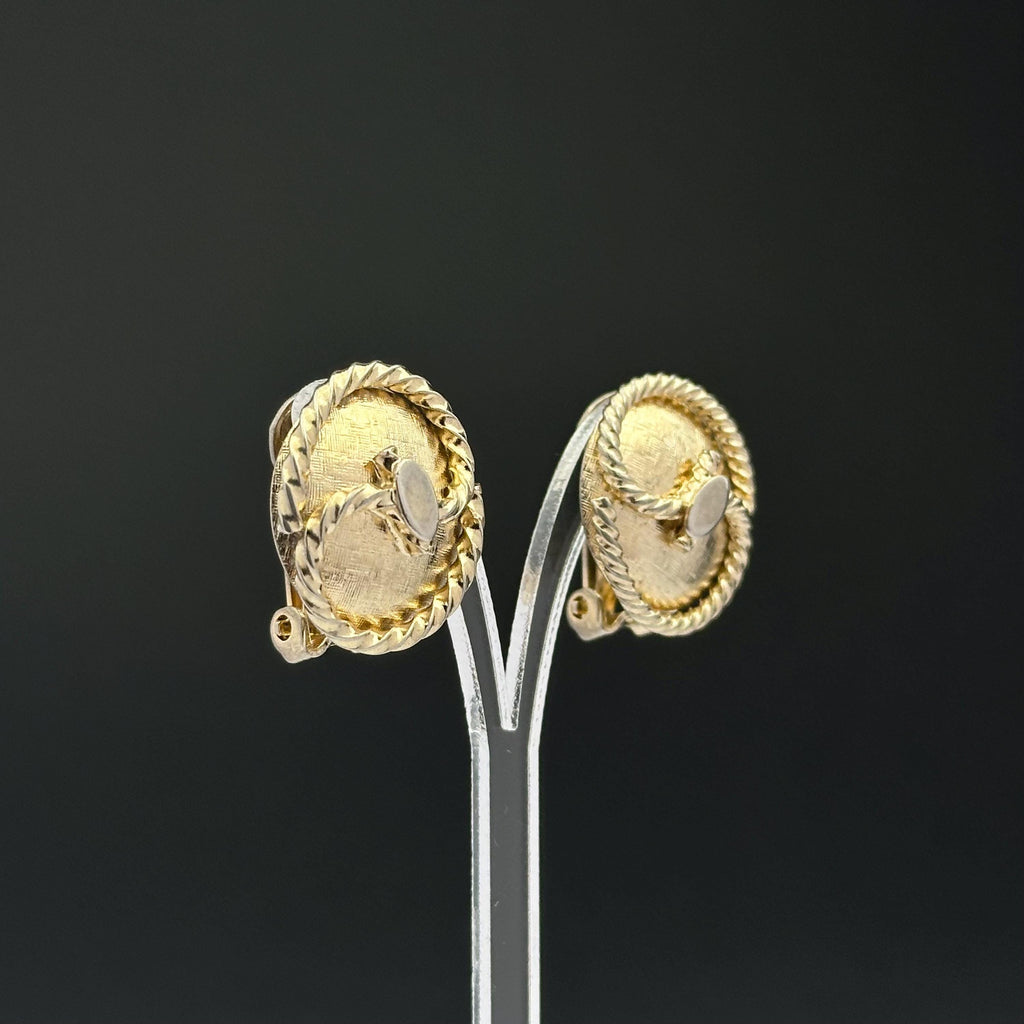 Vintage gold tone oval clip on earrings