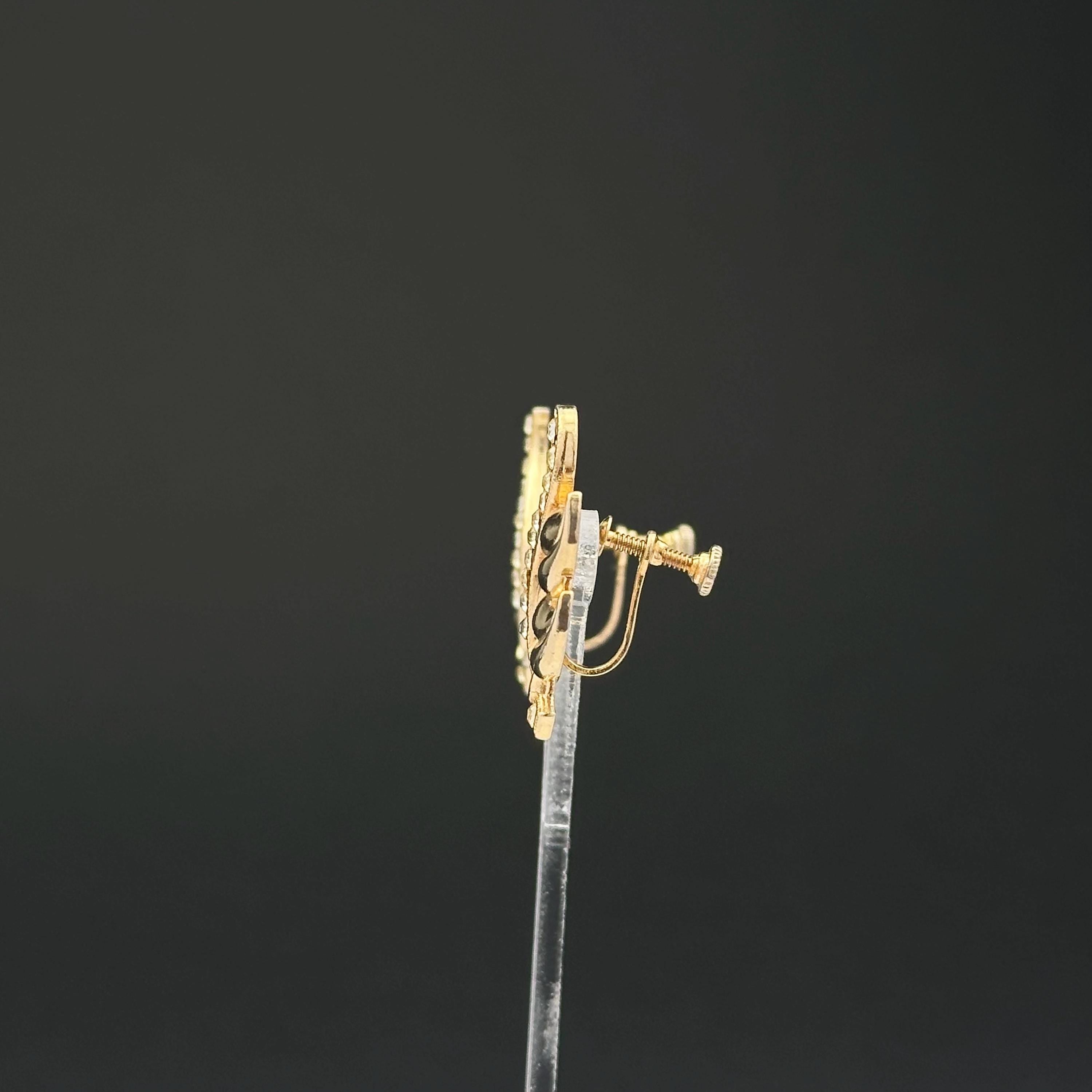 Vintage gold-tone leaf and clear rhinestones screw back earrings