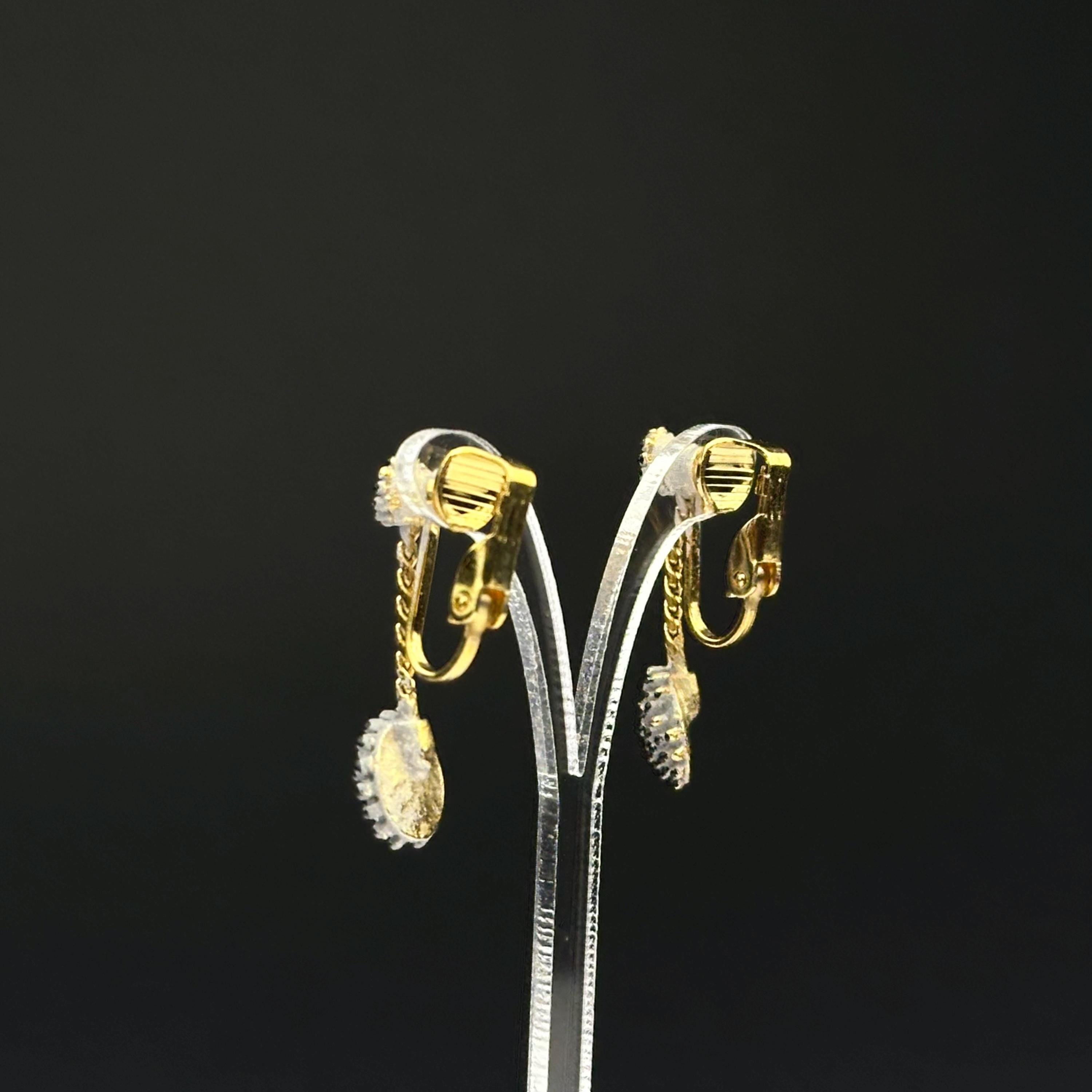 Vintage gold tone and gray enamel dangle drop clip on earrings