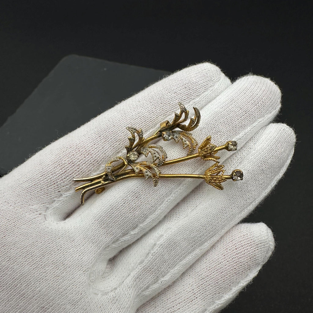 Vintage gold tone and crystal bouquet brooch