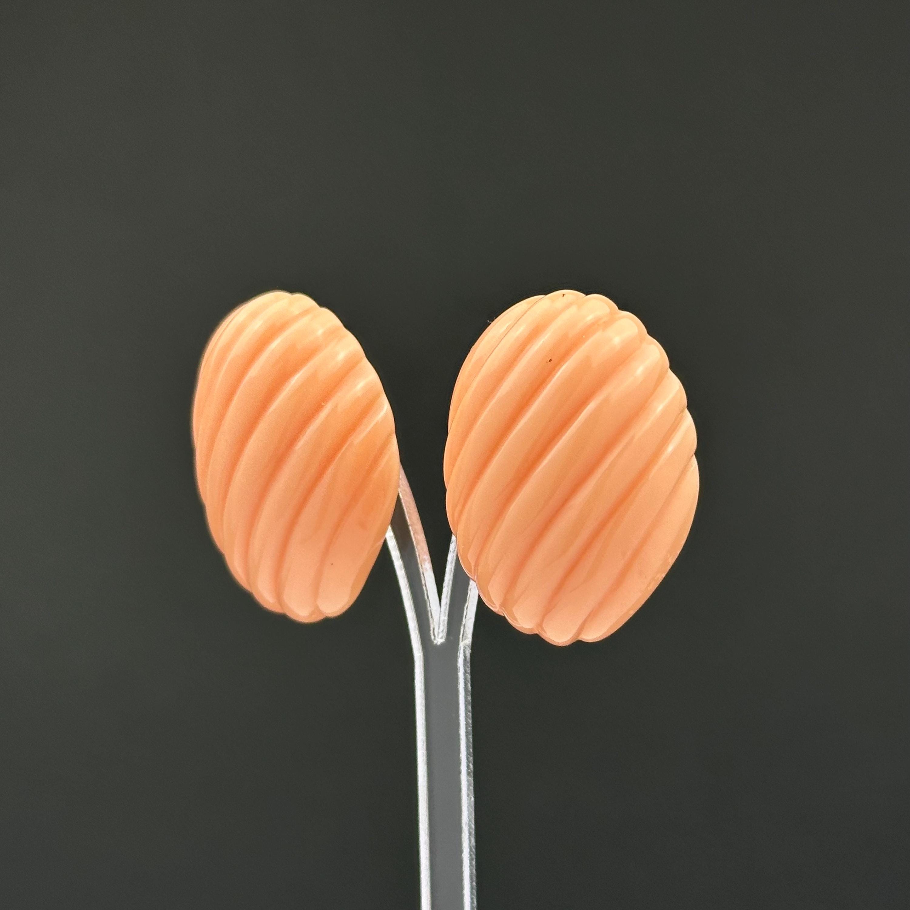 Vintage Trifari Peach Ribbed Plastic Clip On Earrings, 1980s