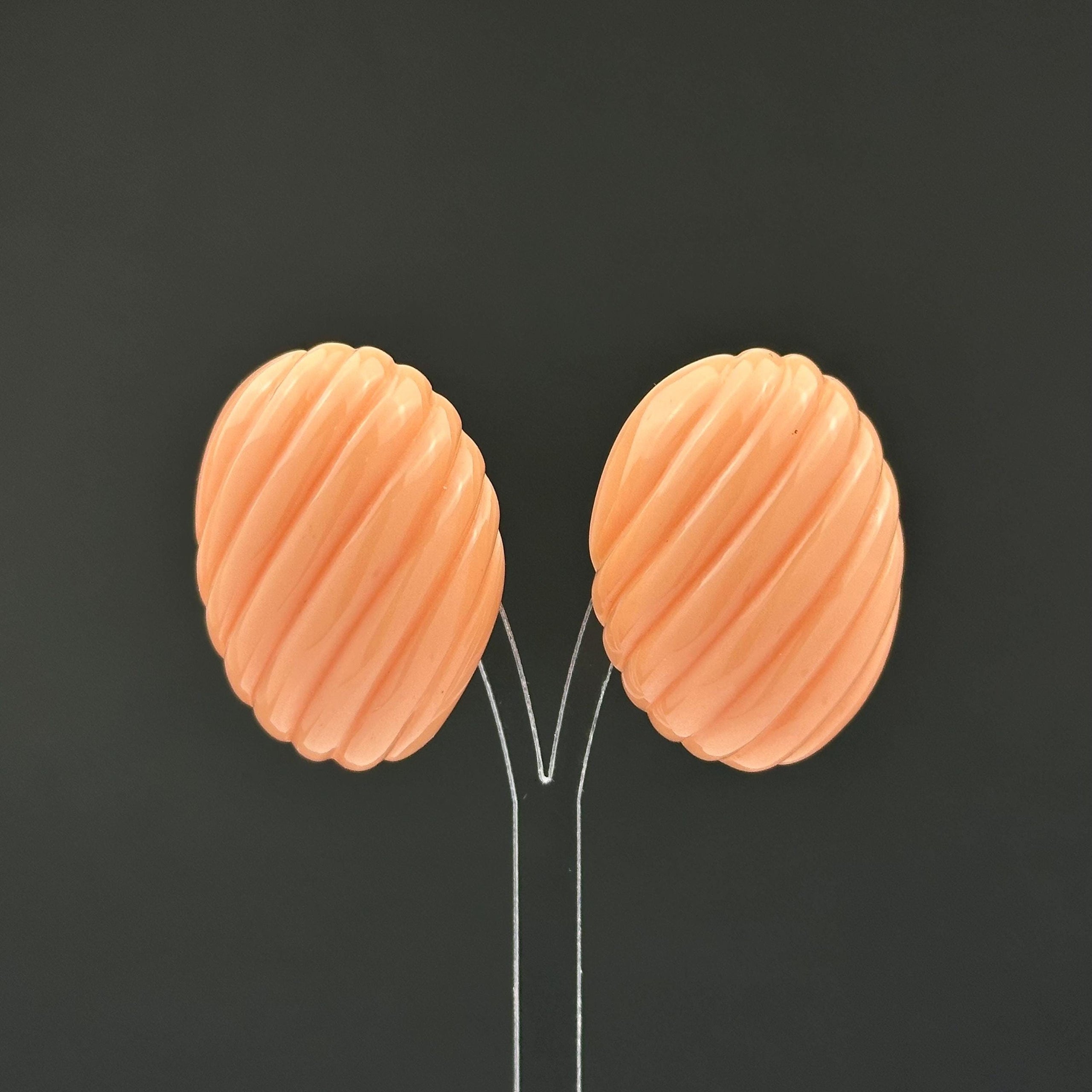 Vintage Trifari Peach Ribbed Plastic Clip On Earrings, 1980s