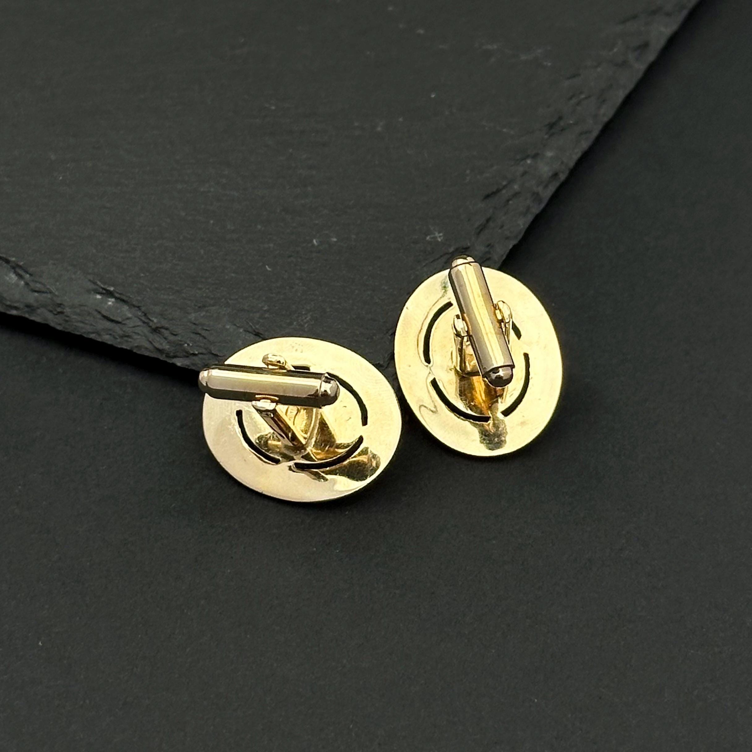 Vintage Dante gold-tone and red cat’s rye cabochons cufflinks