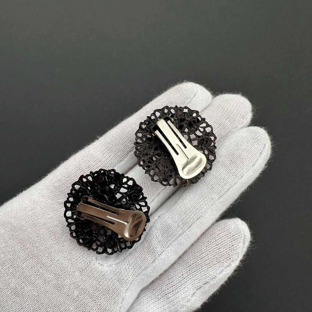 Vintage black filigree clip on earrings