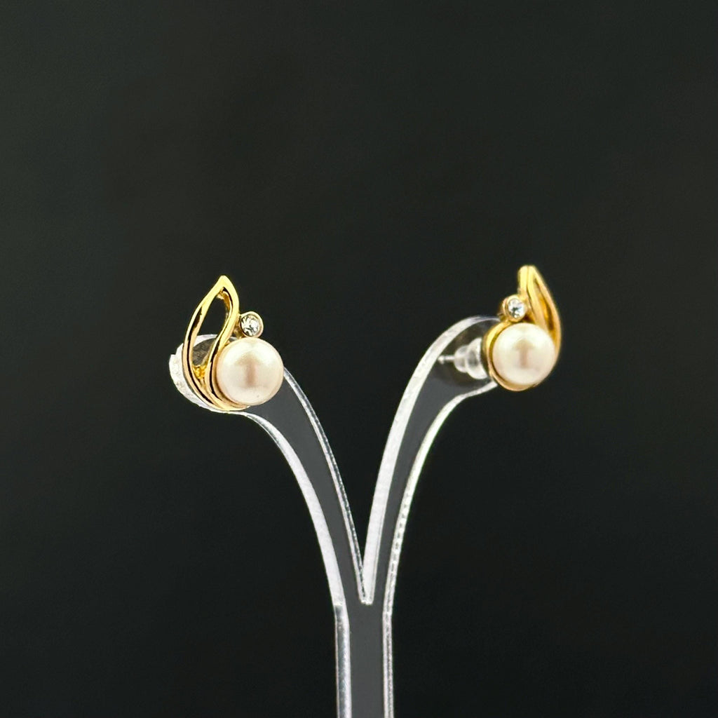 Vintage gold tone and faux pearl leaf earrings