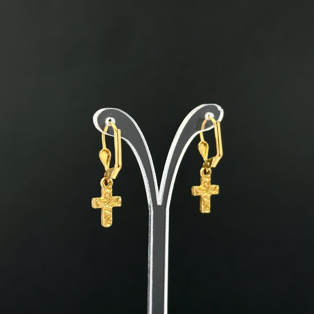 Vintage 1928 gold tone cross drop earrings with clear rhinestones