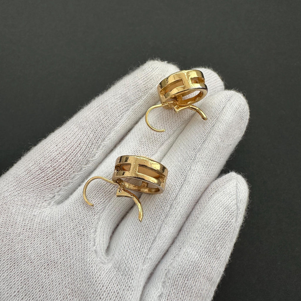 Vintage gold-tone and beige cabochons dangle openwork earrings