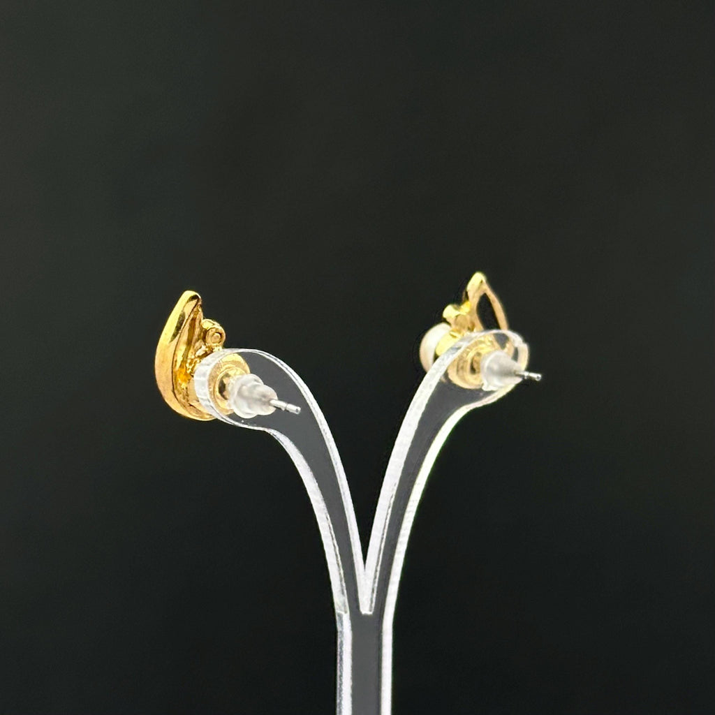 Vintage gold tone and faux pearl leaf earrings