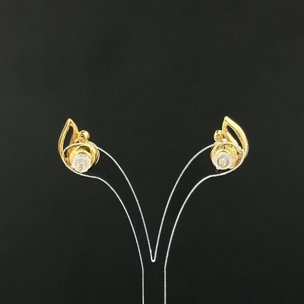 Vintage gold tone and faux pearl leaf earrings