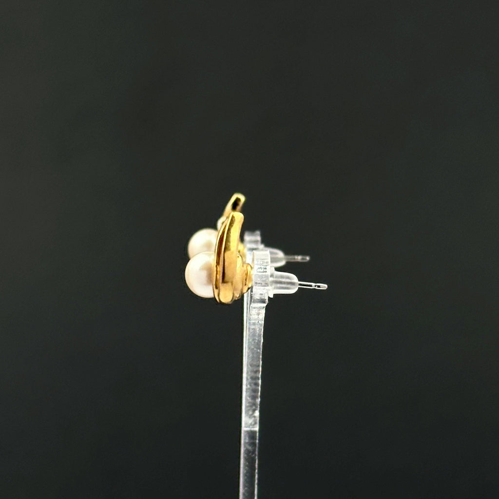 Vintage gold tone and faux pearl leaf earrings
