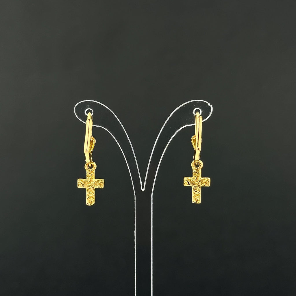 Vintage 1928 gold tone cross drop earrings with clear rhinestones