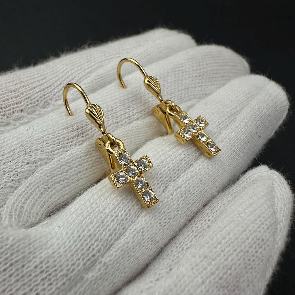 Vintage 1928 gold tone cross drop earrings with clear rhinestones