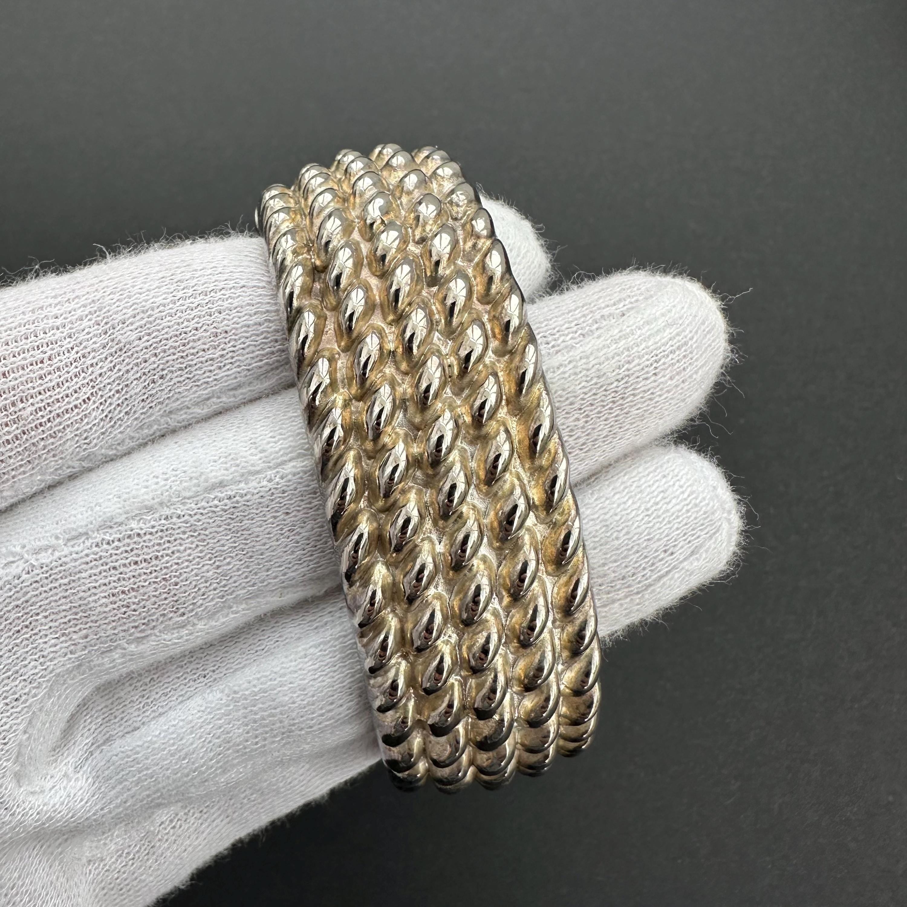 Vintage wide silver-tone textured hinged bangle