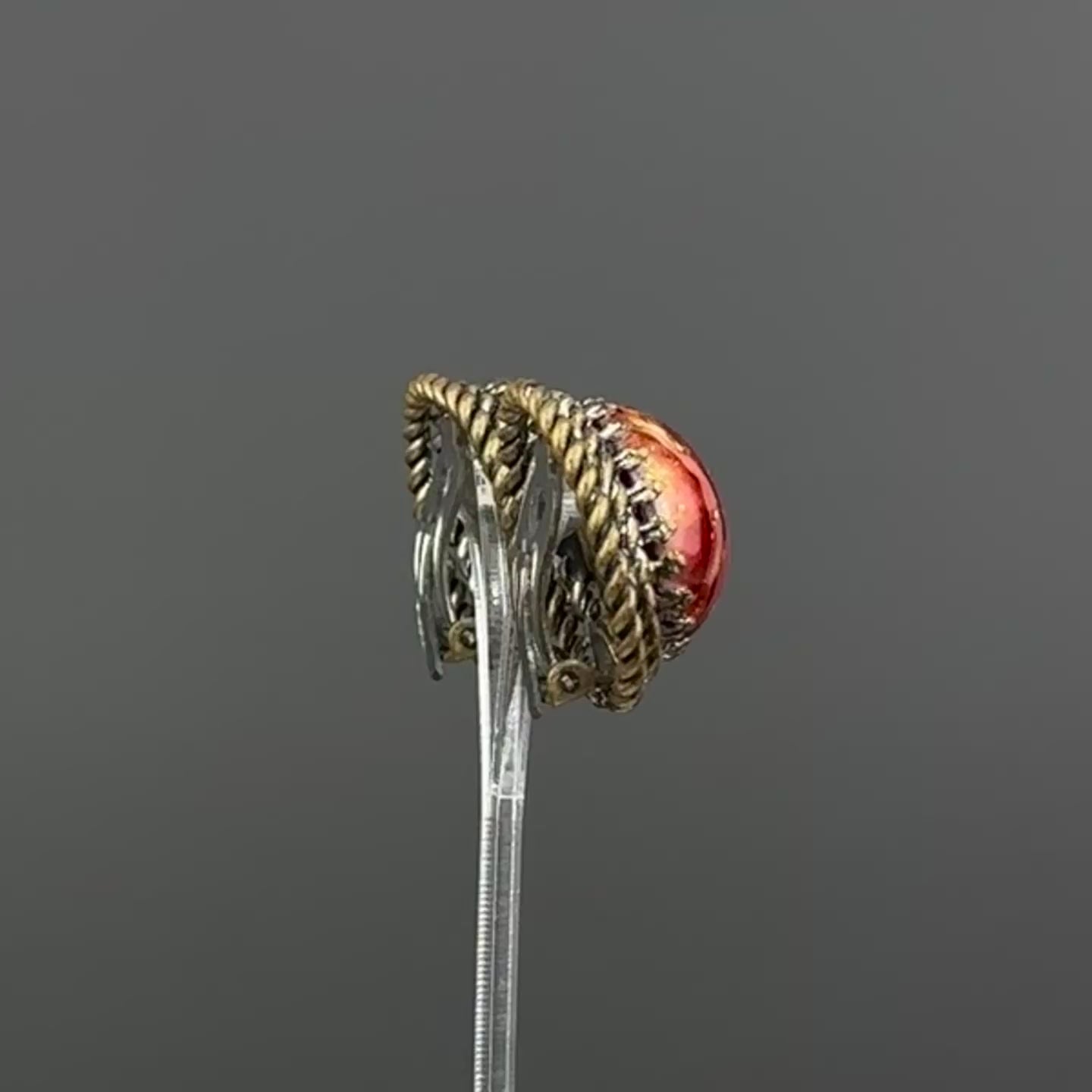 Vintage bronze tone and red art glass round clip-on earrings
