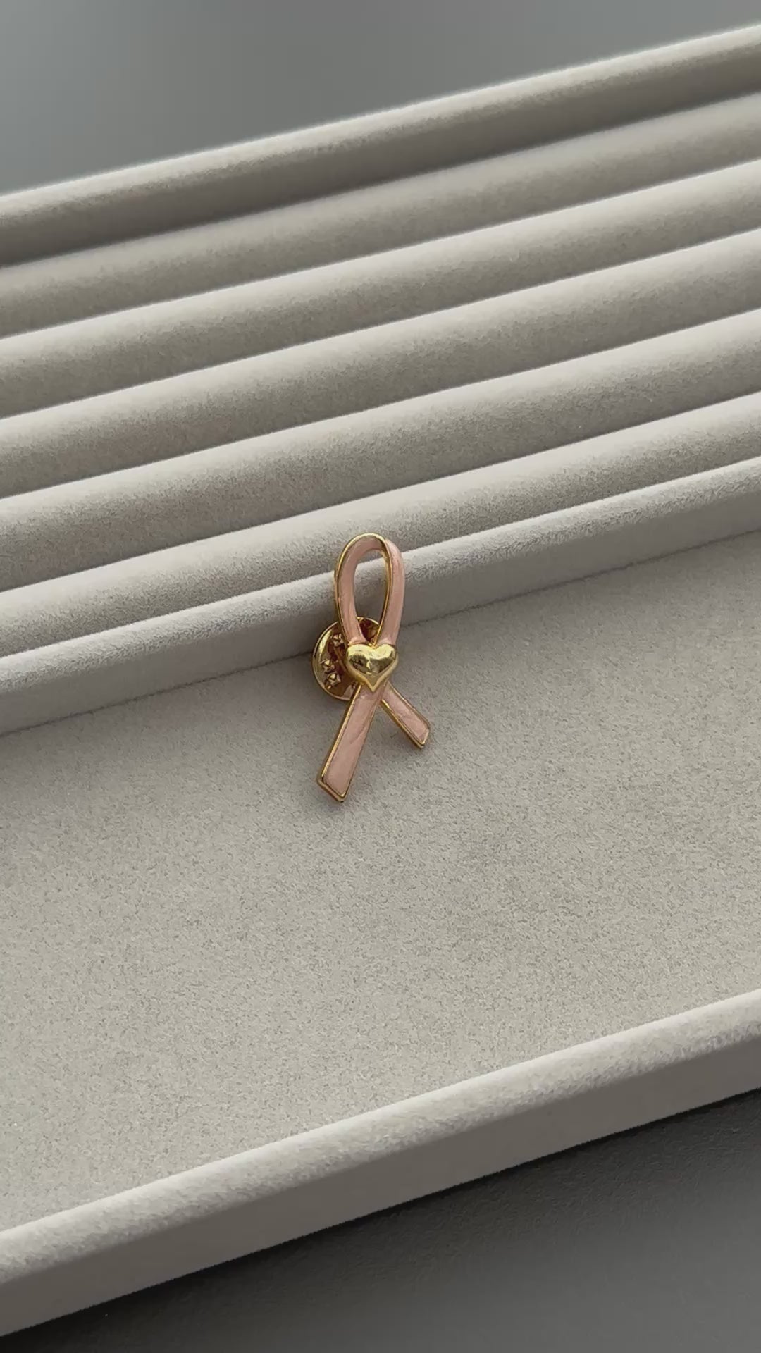 Vintage AVON gold tone and pink enamel ribbon heart lapel pin